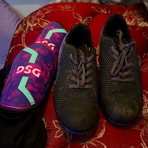 DSG brand soccer cleats and shin gards